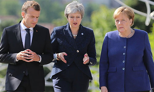 May, Merkel y Macron llaman a cumplir el acuerdo nuclear con Irán